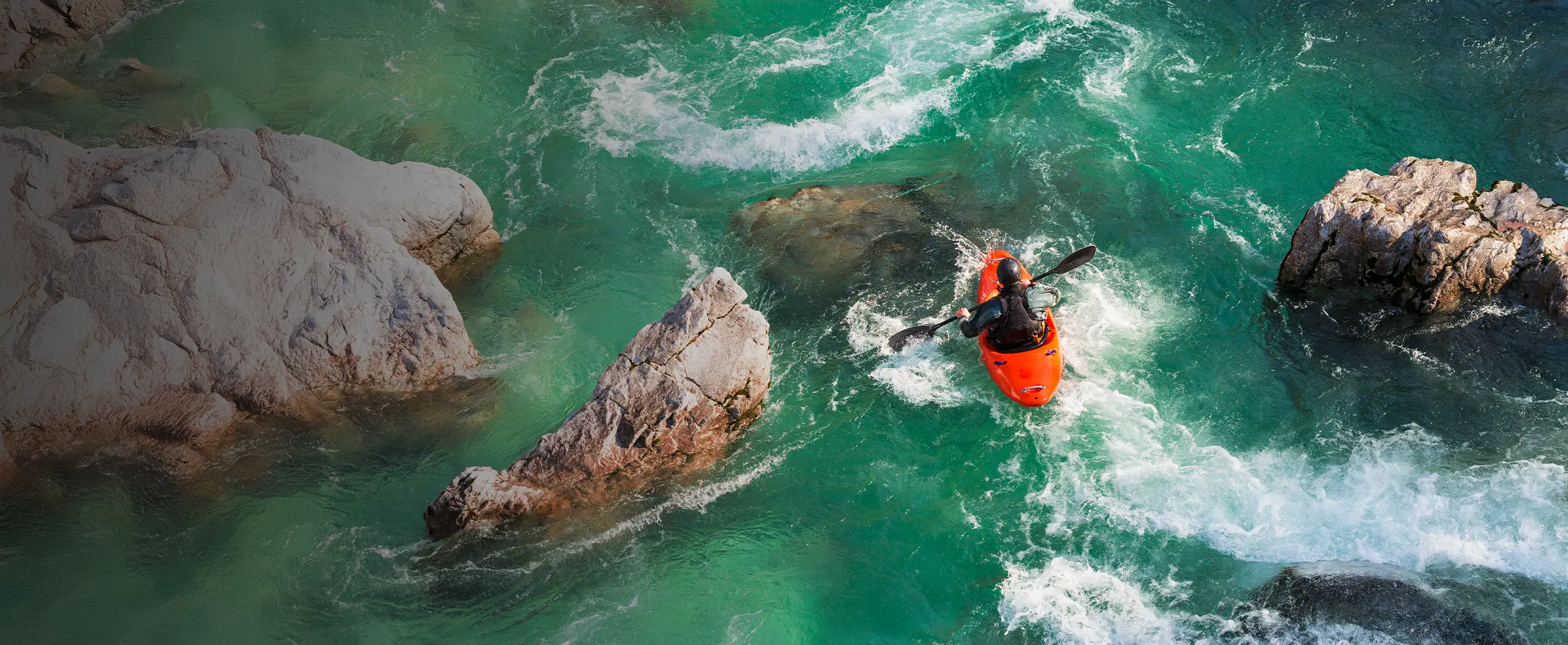 Kayaker in rapids